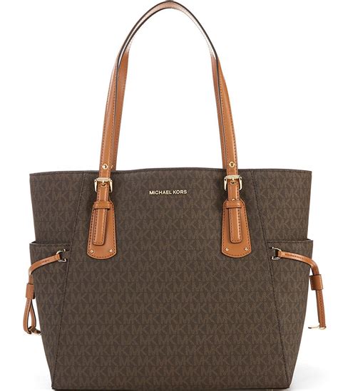 michael kors signature tote sale|michael kors voyager signature tote.